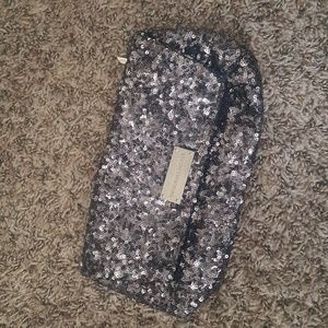 Sequin metallic clutch